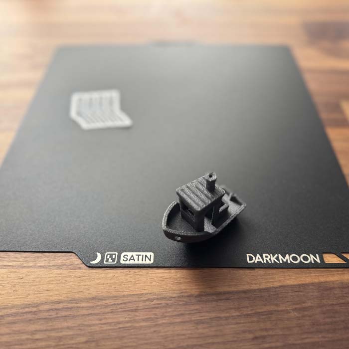 Satin Build Plate for Bambu Lab by Darkmoon 3D with Nylon Carbon Fiber Benchy on it